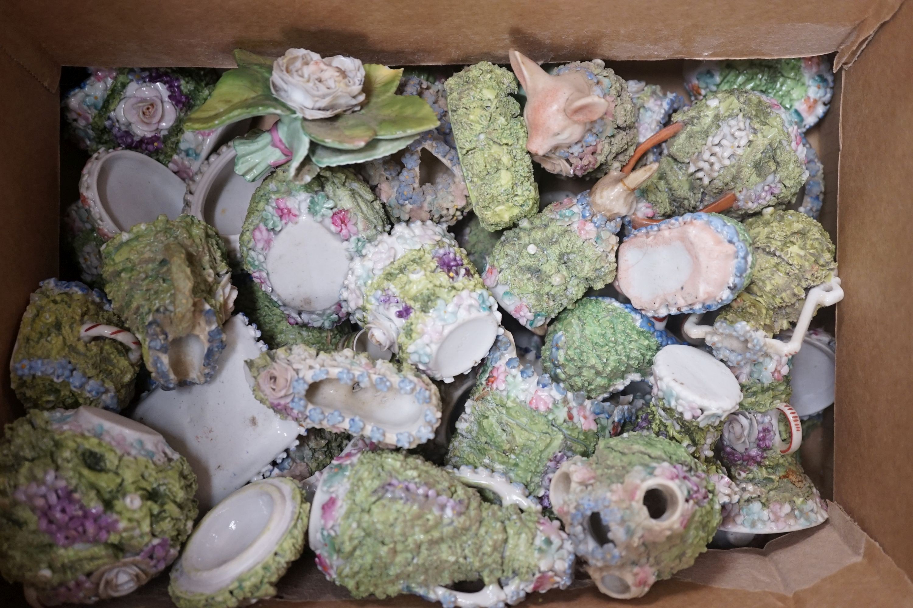 A quantity of floral encrusted mossware